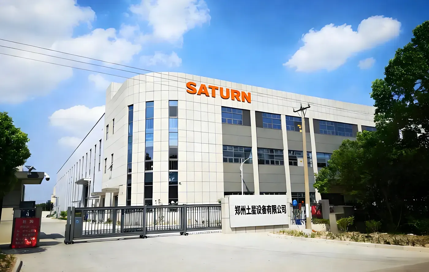 Saturn Machinery workshop floor in Xingyang, Zhengzhou — ribbon and plough mixers under assembly